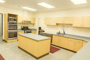 view of kitchen with sink and ovens