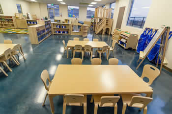 play area with tables and chairs