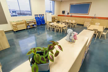 tables and chairs in a play room