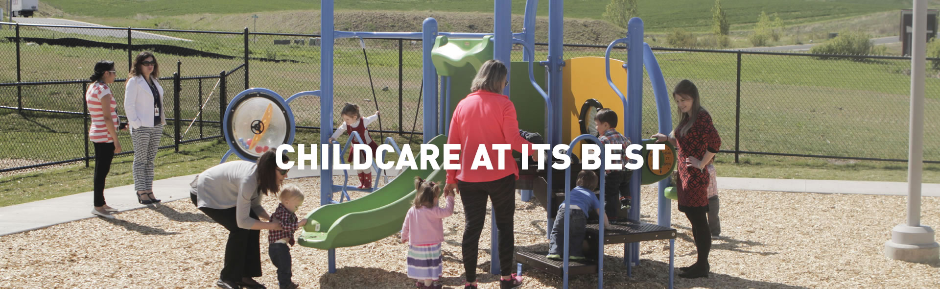 teachers playign with children outside